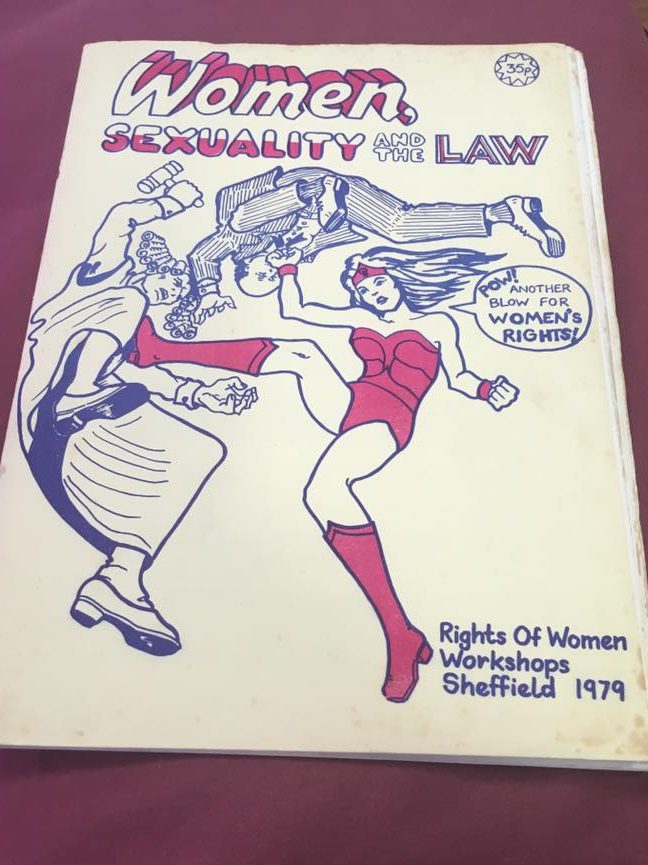 An image of the front of a Women's Newsletter from 1979, as part of the 'Rights of Women Workshops Sheffield', titled 'Women, Sexuality and the Law'. The image on the front is a female superhero fighting two men.